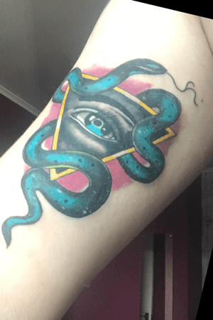 5th tattoo, all seeing eye with a snake 