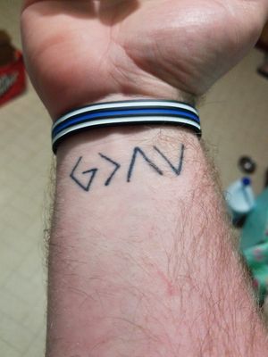 God is Greater than the Highs and Lows.My wife and I got this as a matching tattoo.
