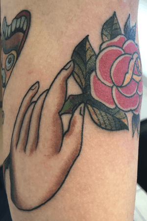 Traditional hand and rose