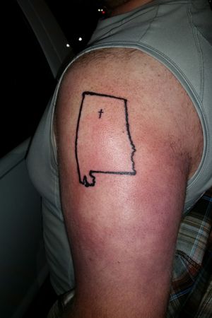 My first tattoo. The cross is over my hometown of Cullman.
