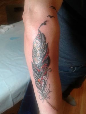 Stylized feather w/birds tattoo on forearm...Thanks for looking 