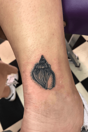 First tattoo of a conch shell given to me by a client, was her first tattoo too