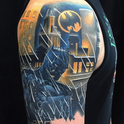 Batman in the rain tattoo done on an upper shoulder. #batman #shoulder #color #comic 