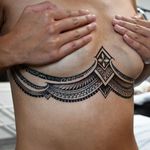 Mixed tribal Polynesian ladies piece mid chest 