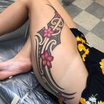 Ladies Polynesian tribal tattoo. Side thigh piece and hips