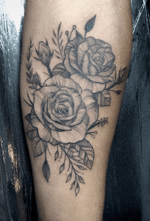Beautiful dotwork and fine line rose tattoo on lower leg by Justin JP Param.