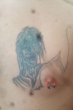 Cover up of my fiance's tattoo that used to say "Stephanie" . BYE stephanie! A zombie ate your ass ;) big thanks to Blair! Hope i spelt that right! HIGHLY RECOMMEND InkFix tattoo studio to anyone in the sudbury area, especially if you need a cover up! 