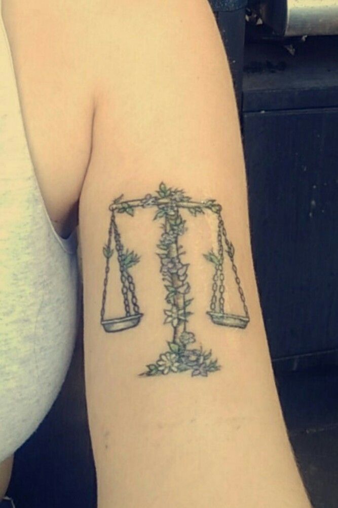 My first tattoo. Libra Scale, done by Sam at Bad Apple Custom