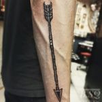 Arrow on back of arm, constructed entirely from dots! 