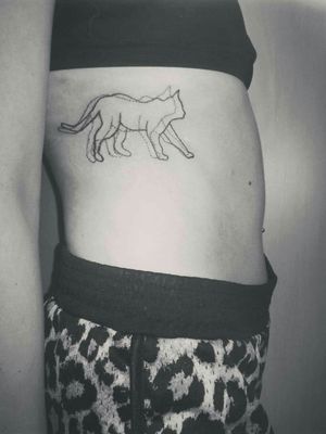 Dot-line cat tattoo