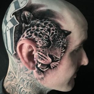 Tatuaje de Codey Doran #CodeyDoran #facetattoos #facetattoo #scalptattoo #headtattoo #jobstoppers #realism #leopard #junglecat #blackandgrey