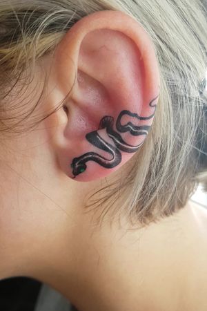 Snake earlobe tattoo. #snake #eartattoo 