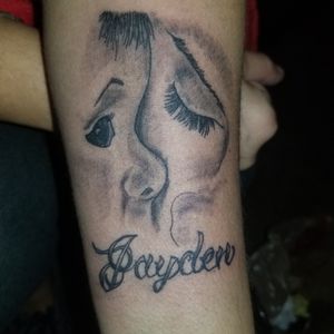 Mother and son tattoo
