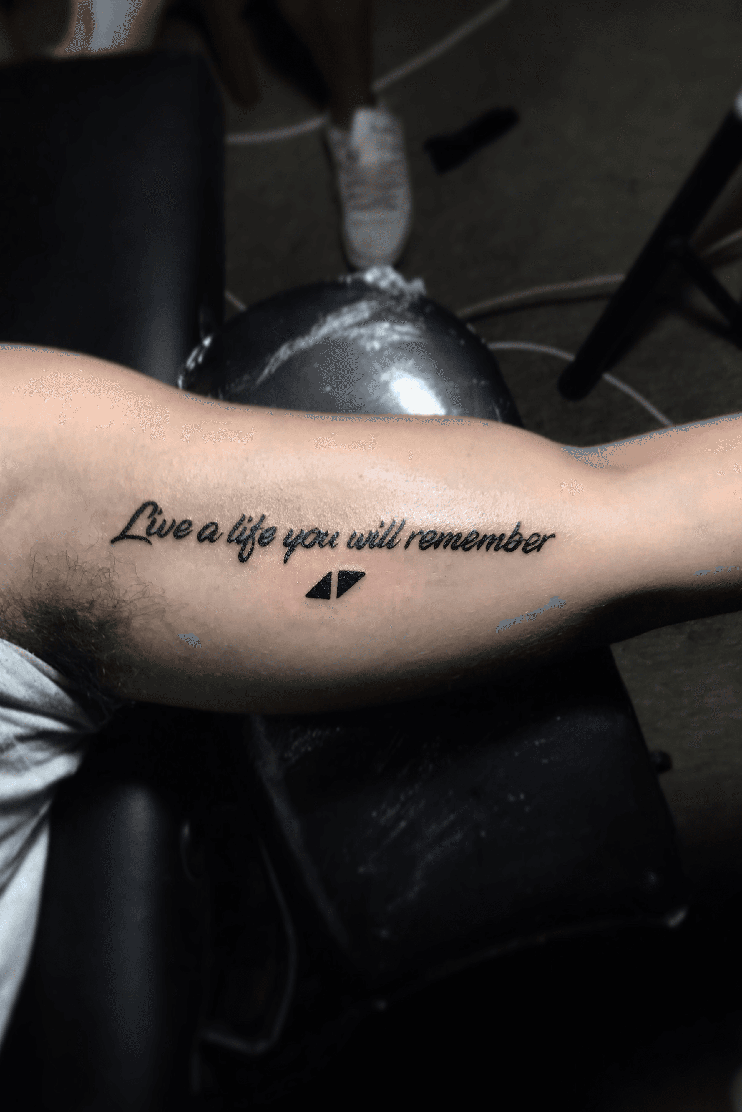 Avicii logo on back neck    ALIVE Tattoos  Piercing  Facebook