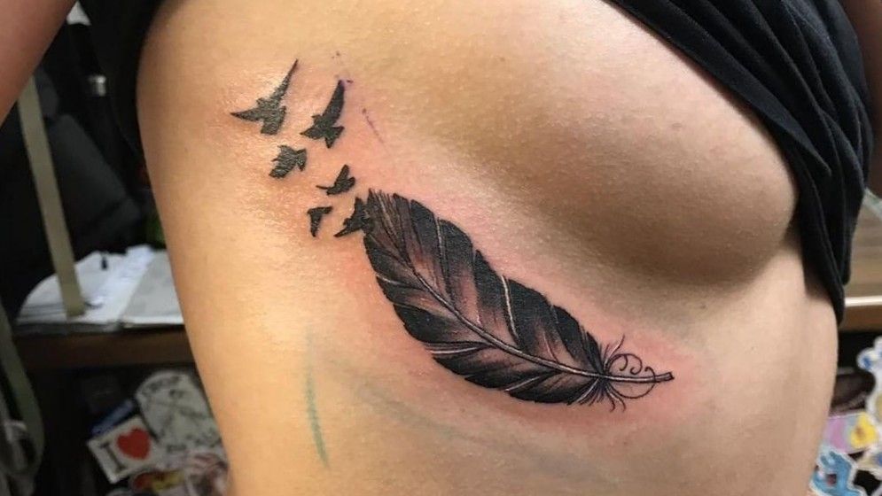 Line Feather Tattoo on Ribs  Best Tattoo Ideas Gallery