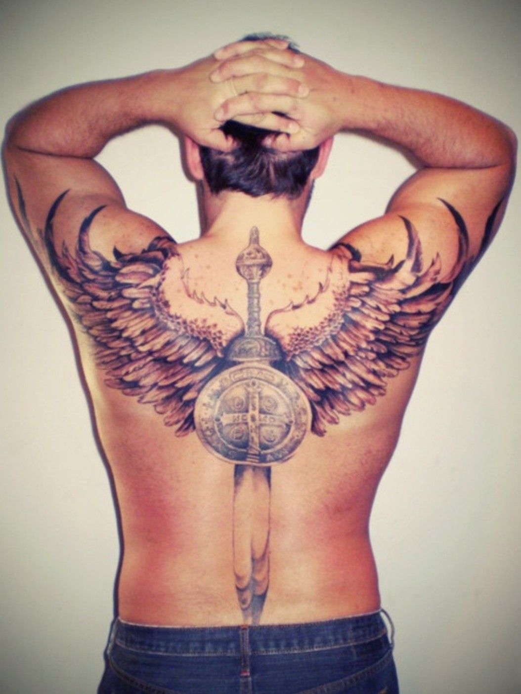 Tattoo uploaded by ️ ️ • #wings #backtattoo #feathers #blackandgreytattoo #sword #shield • Tattoodo