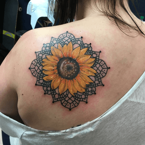 Sunflower mandala, tried for more of a paint style on this one  #solidink #meekBtattoos #sandiego #california  #traditionaltattoo #color #BoldTattoos #life ##hivecaps #fkirons #neotraditional #neotraditionaltattoo #floral #sunflower #mandala #backtattoo 