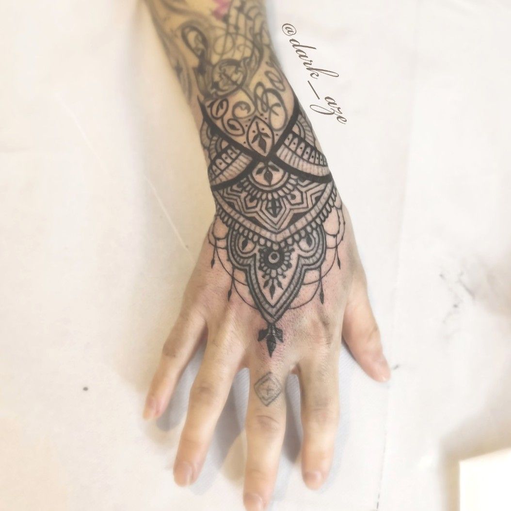 CloseUp Shot of a Person with Mehndi Tattoo  Free Stock Photo