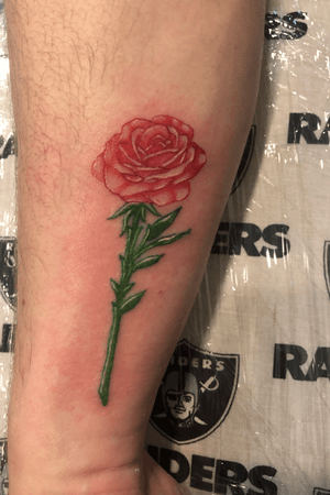 Mini rose tattoo done by our resident artist @rafaelsolano90 #rose #RoseTattoos #tatted 