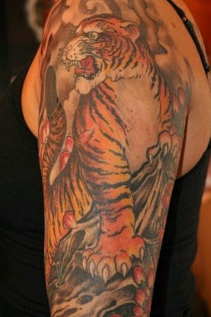 Tiger tattoo by Dan Moses