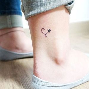 Star heart want a row of 8 of these on my back with the blackbirds carrying them to the sky