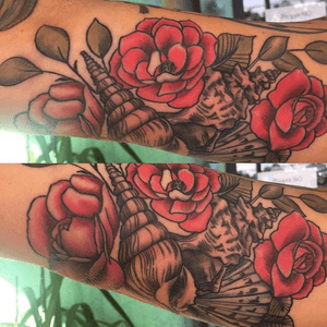 Sea shells and wild roses on the inside of the arm 