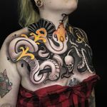 Tattoo by Cristian Casas #CristianCasas #necktattoos #necktattoo #neck #jobstopper #neotraditional #darkart #snake #artdeco #reptile #skull #death #pearls #Artnouveau #chesttattoo