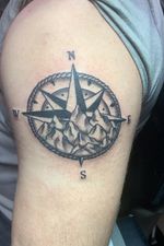 Compass rose, mountains, black and gray