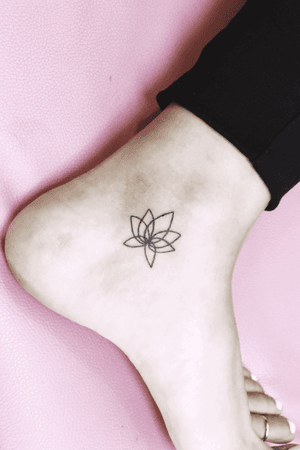 Lotus fine line tattoo