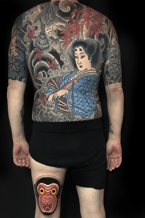 Geisha and hawk with maple leaves 