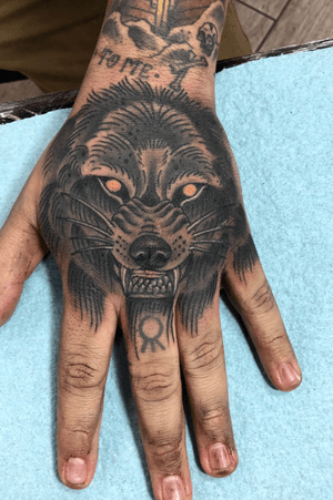 Wolf head done by Alex Avalos #handtattoo #wolfhead #wolf #traditional 