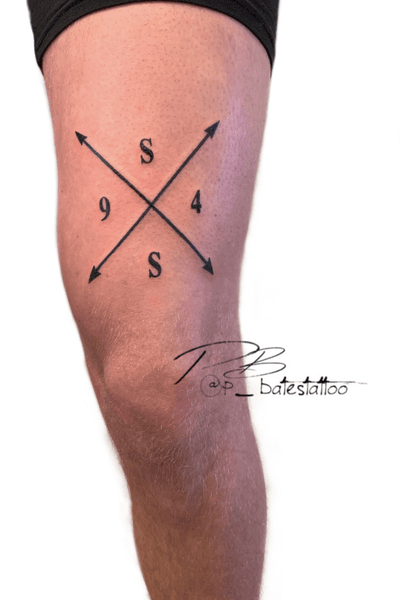 Experience the striking combination of blackwork, illustrative style, and lettering in this unique tattoo by Patrick Bates.