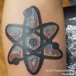 Molecule tattoo with galaxy background in color. Artist is H aka Harrison Conyers @hdc1tattoosandesigns in Baltimore City MD