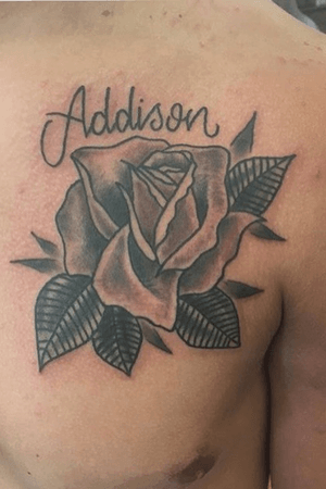 Rose with name on chest