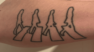 The Beatles at Abbey Road silhouettes. Done by Fabiënne Demmer-Altena at Tattoo Peter, Amsterdam Netherlands at December 29, 2017.