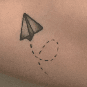Paper plane. Done by Fabiënne Demmer-Altena at Tattoo Peter, Amsterdam Netherlands at June 23, 2017.