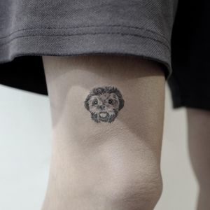 Tattoo by Tattooist Sigak #TattooistSigak #Sigak #dogtattoos #dogtattoo #pup #petportrait #puppy #animal #nature #mansbestfriend #minimal #tiny #small #blackandgrey #illustrative #realism #realistic