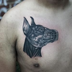 Tattoo by Javier Betancourt #javierbetancourt #dogtattoos #dogtattoo #pup #petportrait #puppy #animal #nature #mansbestfriend #blackandgrey #chicano #illustrative #chesttattoo