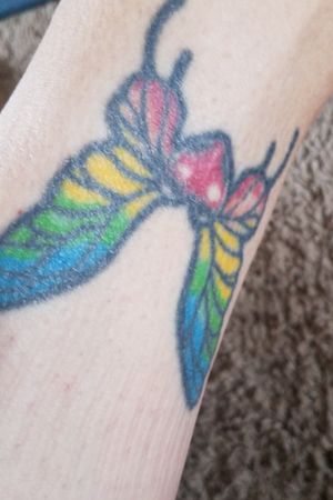 my very first tattoo,i got it out of a hair magazine and thought it was cool,oh little did i know