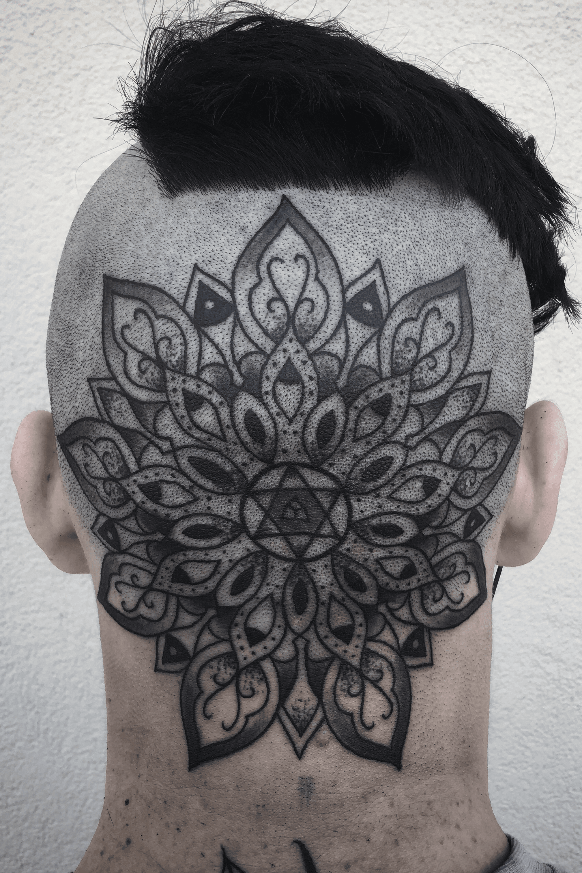 Man back closeup portrait with tattoos on his head and neck Stock Photo   Adobe Stock