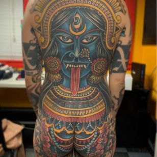 Tattoo by Chad Koeplinger #chadkoeplinger #Kalitattoos #kalithedestroyer #goddessKali #Hindu #HinduGoddess #deity #crown #thirdeye #color #traditional #skull #flower #floral