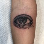 Tattoo by Joe Tartarotti #JoeTartarotti #traditionaltattoo #traditional #Italy #italiantattooartist #blackandgrey #realism #realistic #eye #tear #sadgirl #cry
