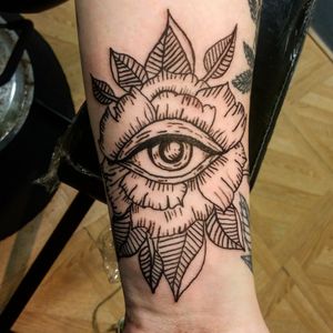 Custom all seeing eye flower linework tattoo design 