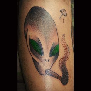 Alien smoking tattoo