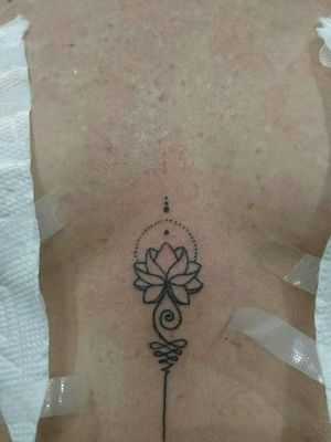 symbol represents the path to enlightenment in the Buddhist culture. The spirals are meant to symbolize the twists and turns in life, and the straight lines the moment #Magaluftattooparlour #Magaluf #Mallorca #summertattoo 