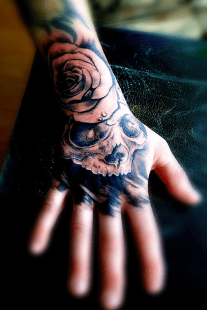 tattoo#handtattoo#skull#rose#blackandgrey