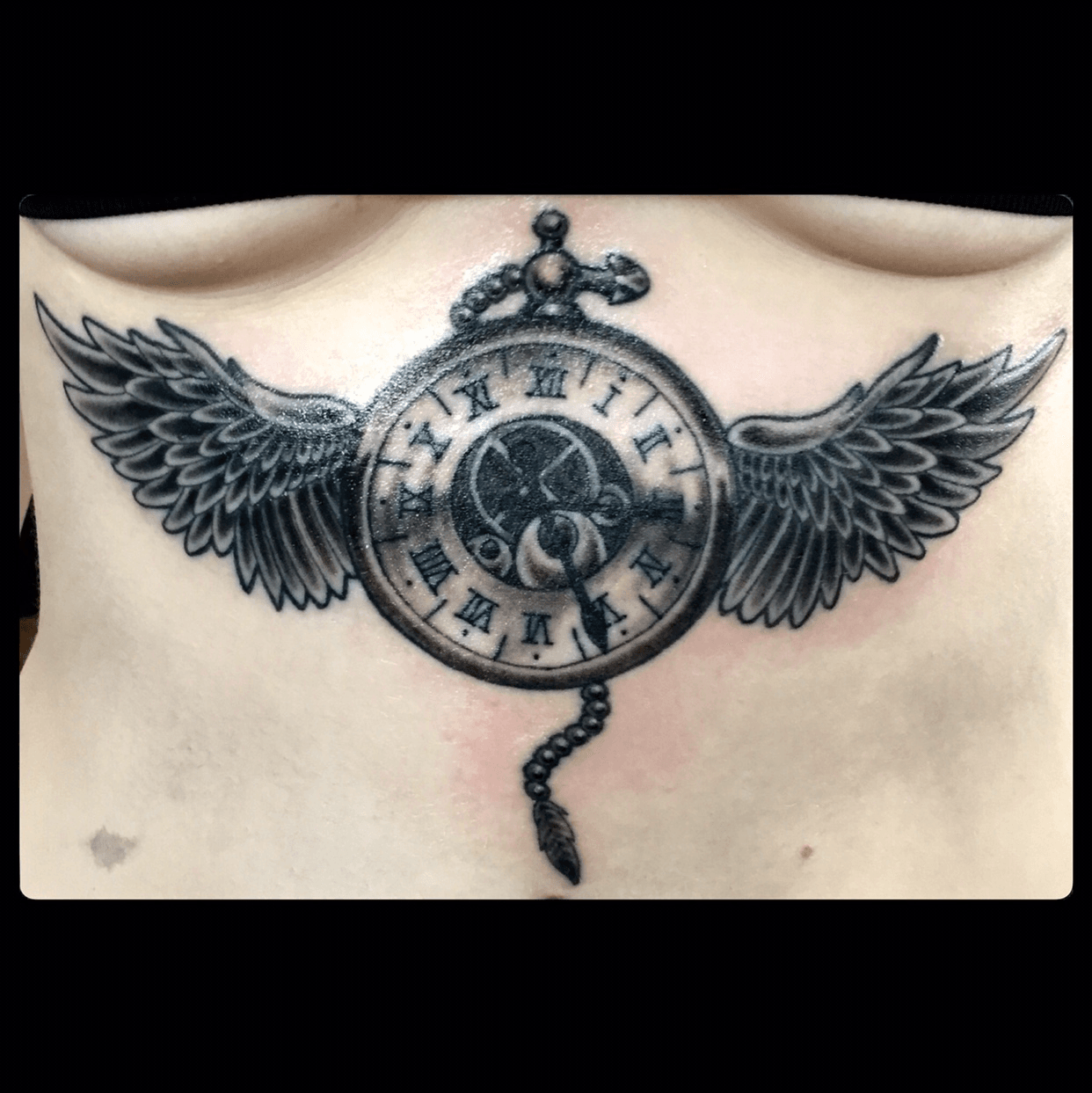 pocket watch with wings tattoo