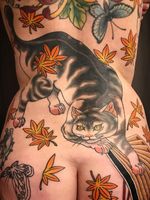 Tattoo by Junior #Junior #besttattoos #favoritetattoos #uniquetattoos #specialtattoos #tattoosformen #tattoosforwomen #Japanese #cat #mapleleaf #leaves
