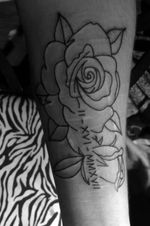 Outline of rose with daughters birthday in Roman numeral 