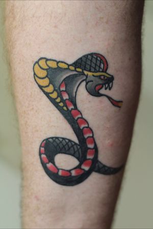 Traditional cobra  #tattoo #tattoos #tattooist #nyctattooartist #tattooer #blackandgrey #tattooartist #nyctattoo  #ink #brooklyn #nyc #newyork  #brooklyntattoo  #inkmaster  #traditionaltattoo #neotraditional #brooklyntattooartist #neotrad #neotradtattoo #newtraditional #neotraditionaltattoo #parkslope  #inked #bk  #tattooart #realistictattoo #maggietattoos #leatherneckstattoo #brooklyntattooshop  #traditionaltattoo 